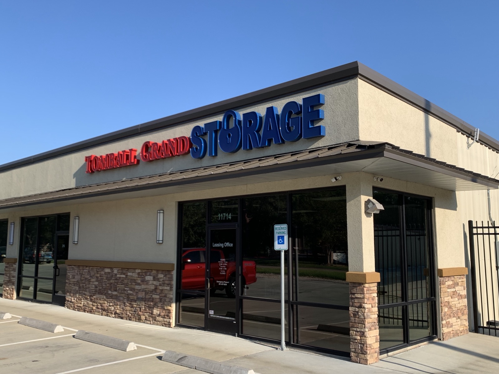 Completed storage facility storefront and gated entry