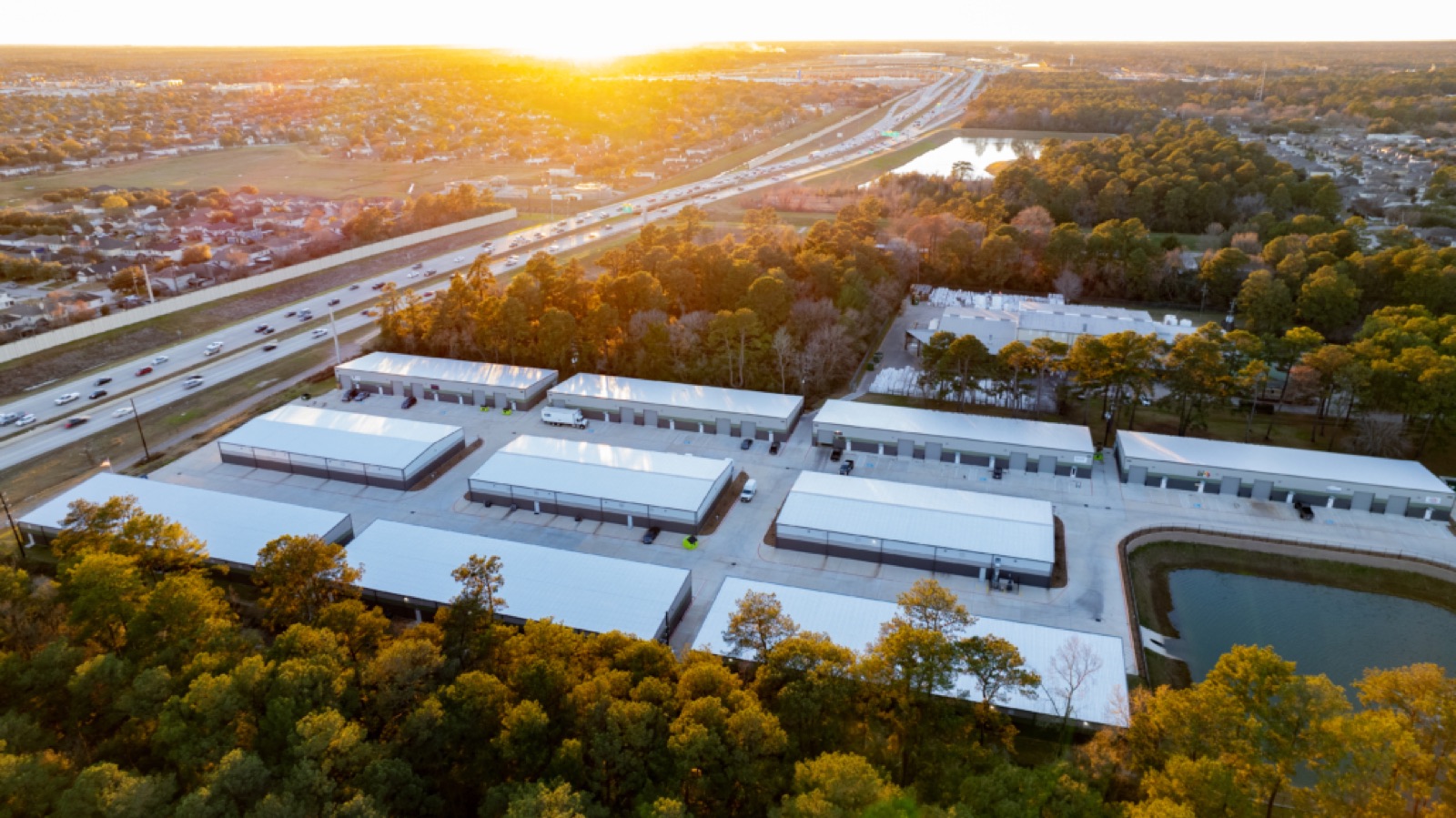 Aerial view of a commercial development alongside a Houston highway