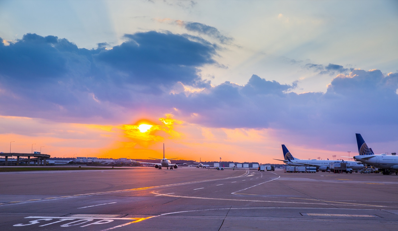 Aircraft on the tarmac at sunset at George Bush Intercontinental Airport