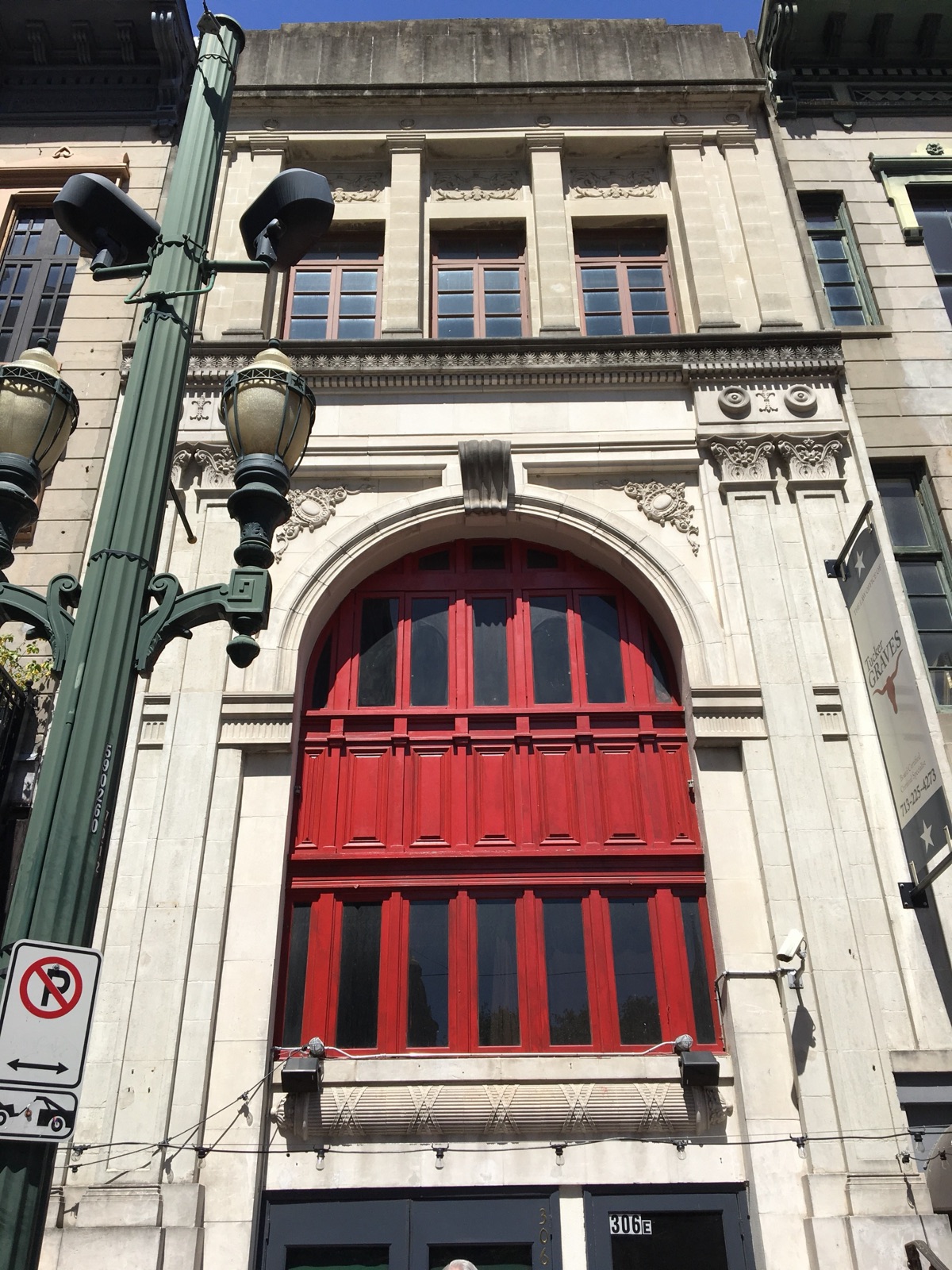 Restored historic masonry facade in an urban commercial district
